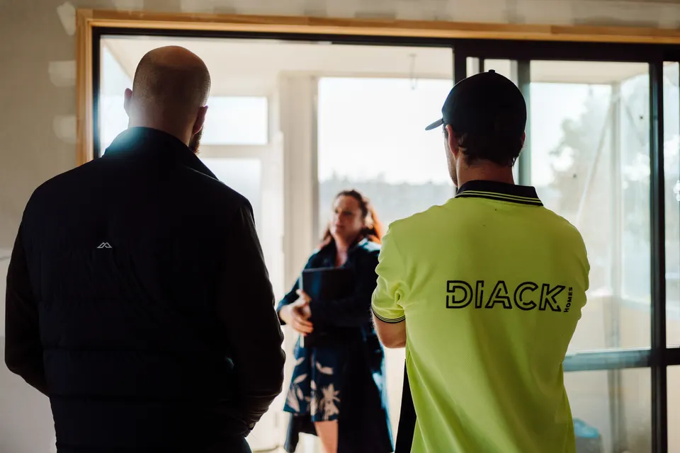 Diack Homes walking a client through their renovation
